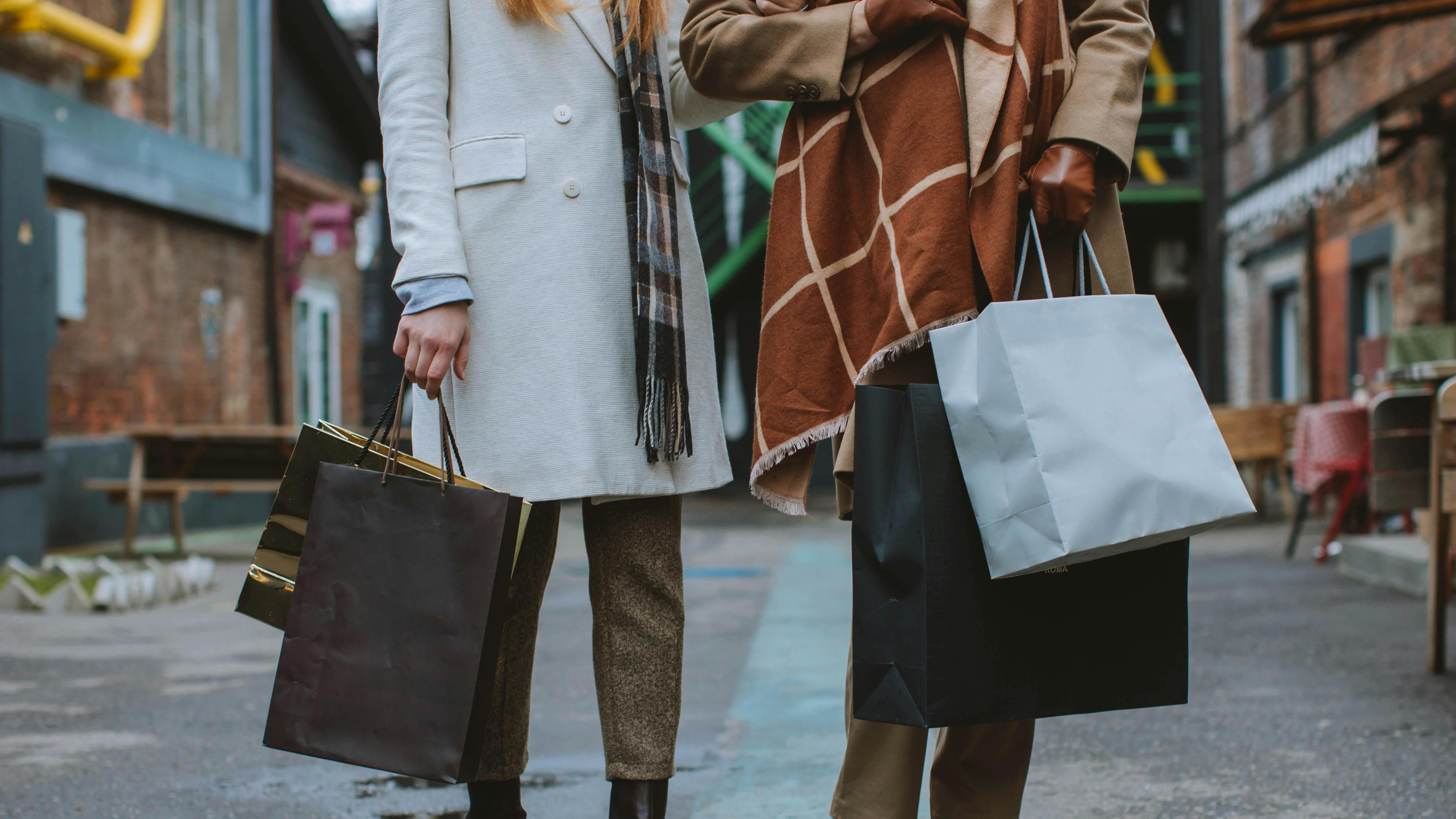 two women with shopping bags